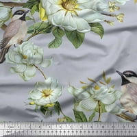 Svijetloplava rajonska krep Tkanina s lišćem, bijela Tkanina s cvjetnim printom i ptice iz